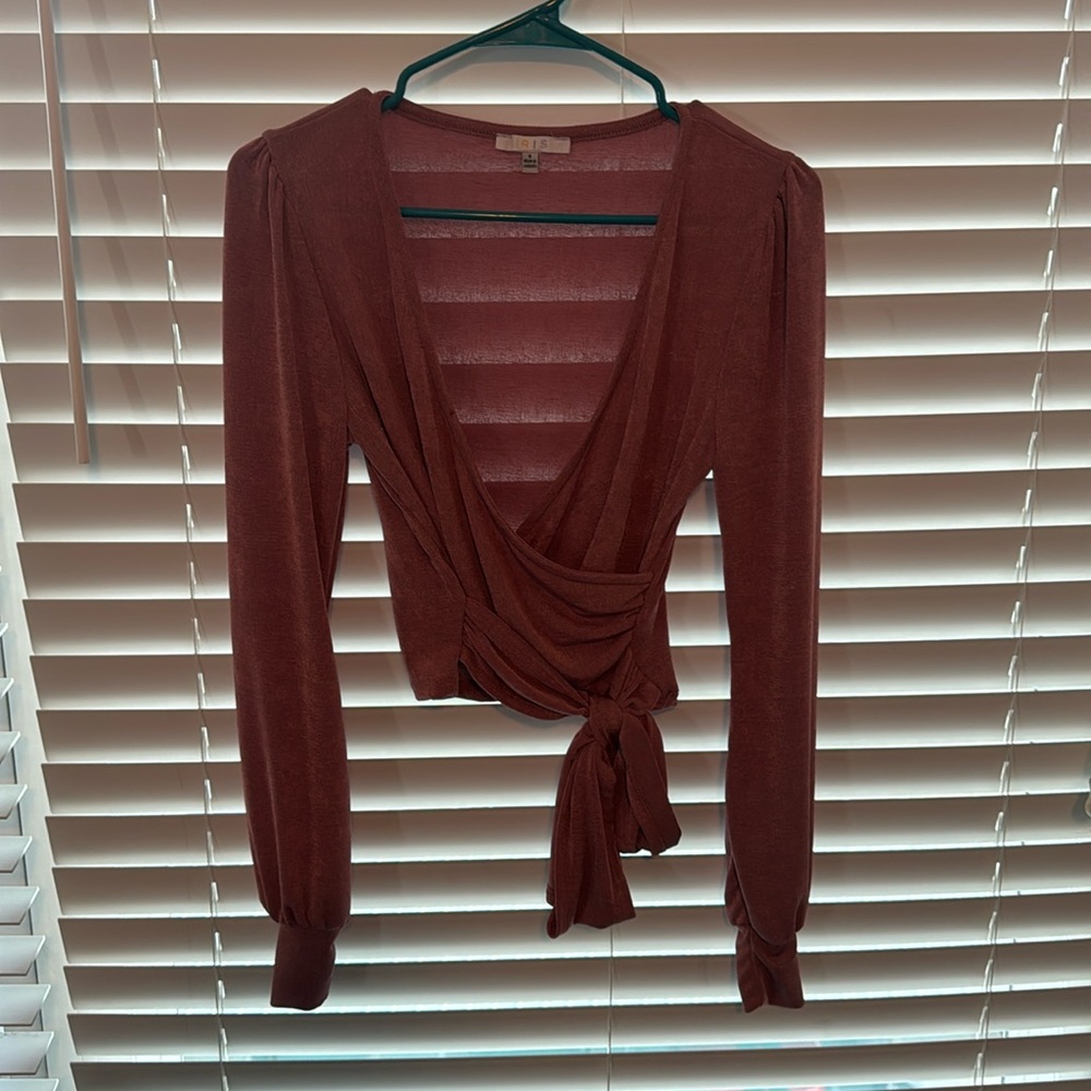 Pink stretch material Iris long sleeve Top that ties around the waist